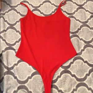 Red ribbed body suit